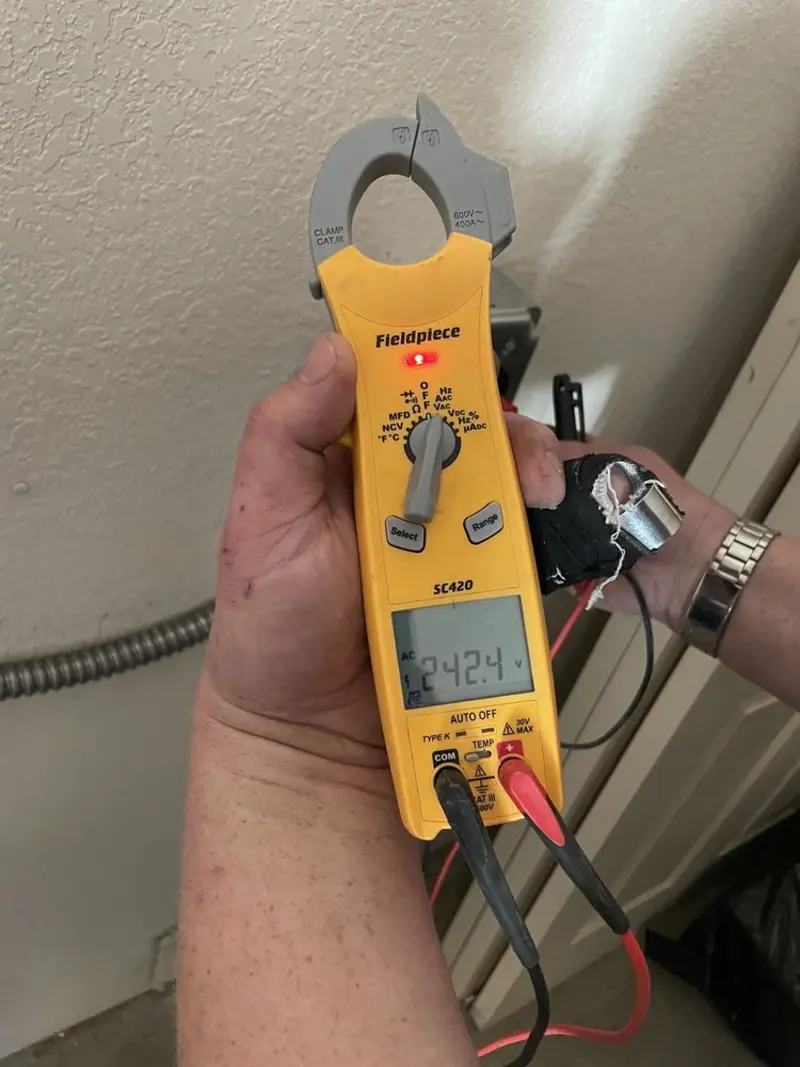 Voltage testing with clamp meter during Generator Installation in Thonotosassa